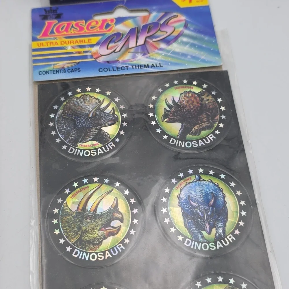 Jurassic Pogs On Sheet Lot Of 32 Dinosaurs Laser Caps USA VTG NEW
